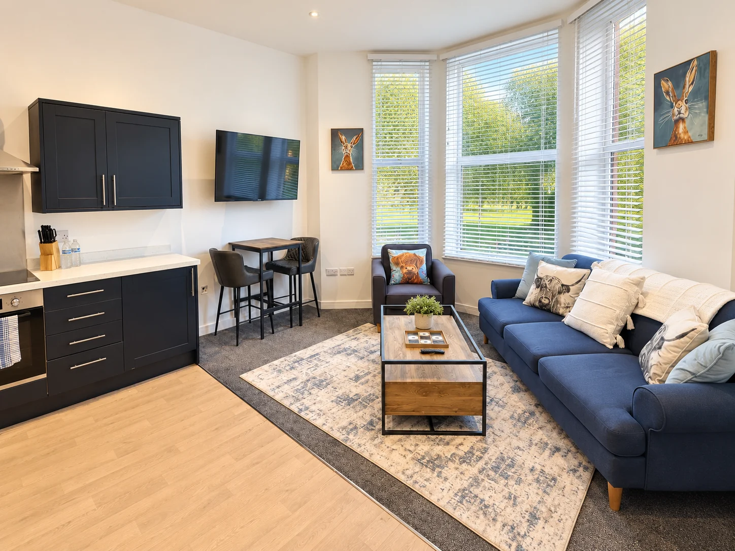 Luna’s bright living room with a park view